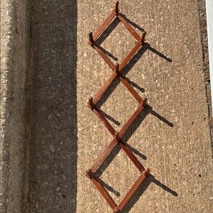 Vintage Accordian expandable wooden peg rack